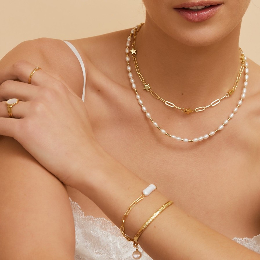 Arms of Eve Girl With The Pearl Bracelet Stack | Bracelet Stacks